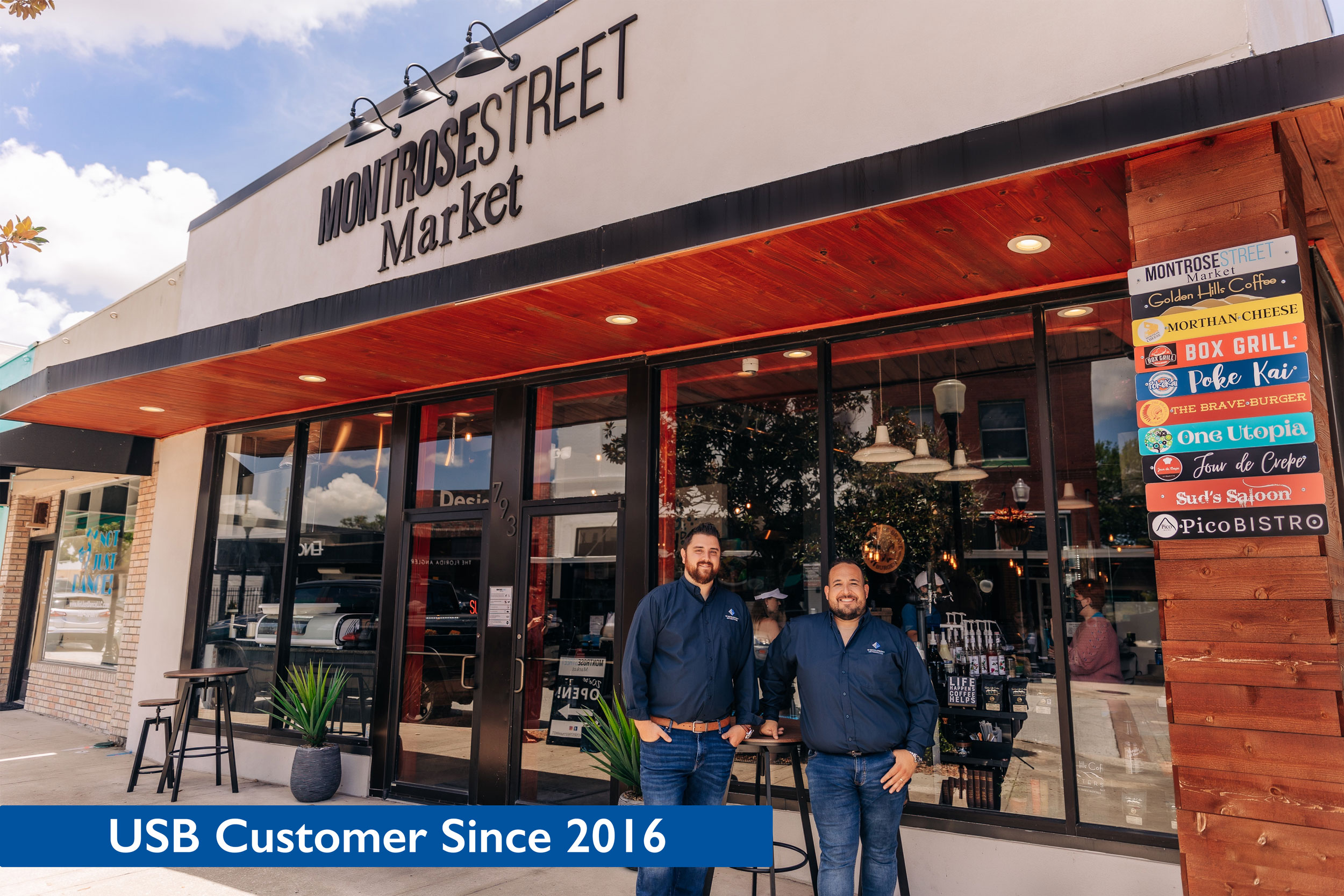 Montrose Street Market owners in front of market