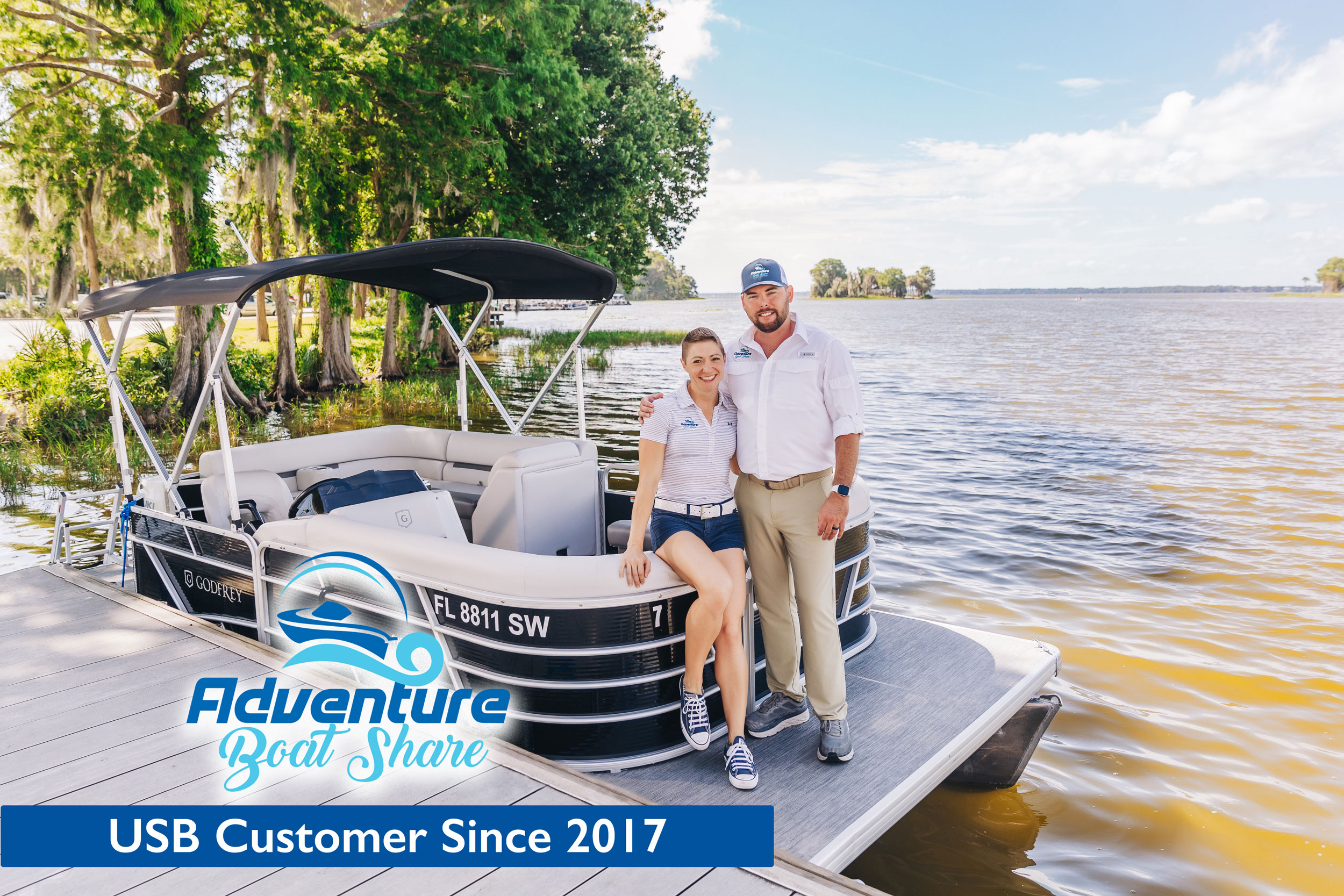 Adventure Boat Share owners at dock on Lake Harris