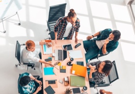 group working around a table